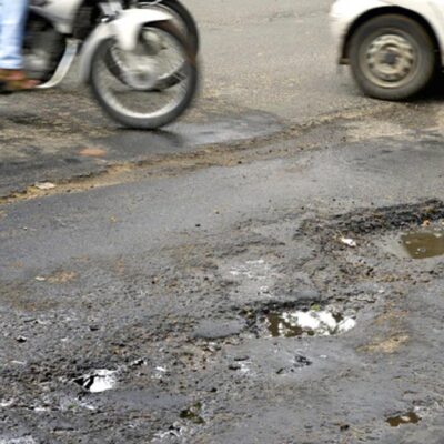 Hyderabads Hospital Road Turns Dangerous with Monsoon Potholes