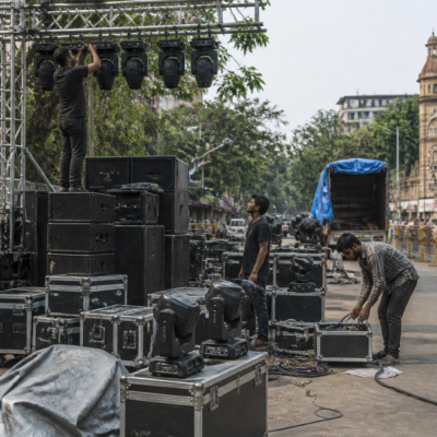 Sound system equipment prepared for a festival procession in Pune amid debate over DJ sound limits