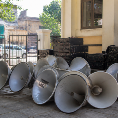 Police-seized loudspeaker equipment linked to a Pune loudspeaker decibel violation during a procession
