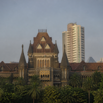 Bombay High Court building representing the case involving missing property documents and SBI compensation