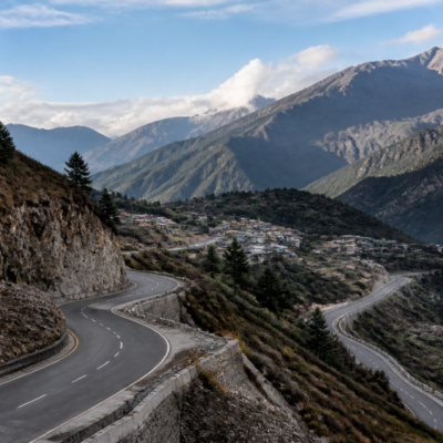 Road infrastructure winding through mountainous terrain in Arunachal Pradesh near India's China border