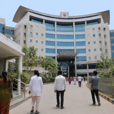Pimpri-Chinchwad Municipal Corporation building representing the Dhanvantari Gold scheme for councillors and families