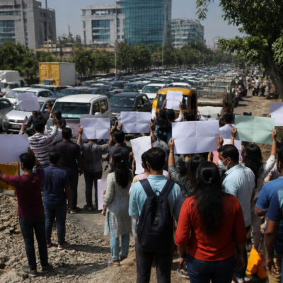 IT employees and residents march during a protest over Hinjawadi infrastructure and traffic congestion in Pune