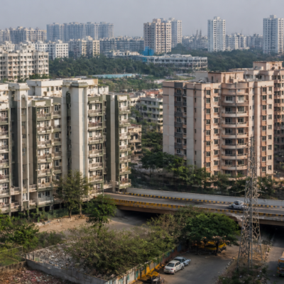 Navi Mumbai cluster redevelopment area in Ghansoli, showing apartment buildings and surrounding urban infrastructure