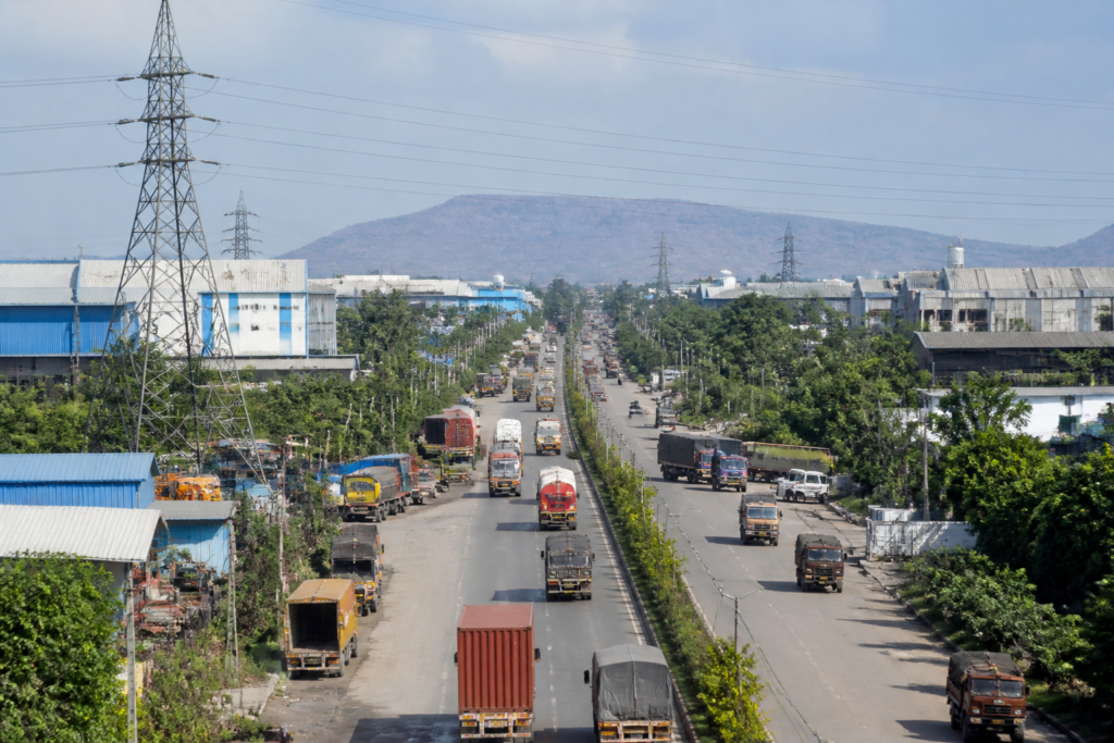 Industrial units and congested roads in the Chakan MIDC industrial area near Pune