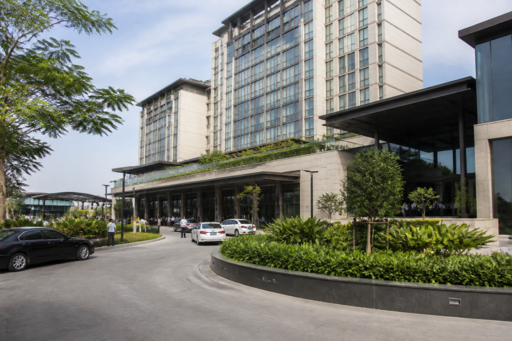 Chalet Hotels hospitality and commercial development expansion represented by a modern hotel complex in an urban setting