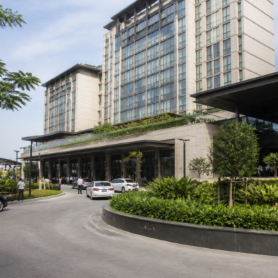 Chalet Hotels hospitality and commercial development expansion represented by a modern hotel complex in an urban setting