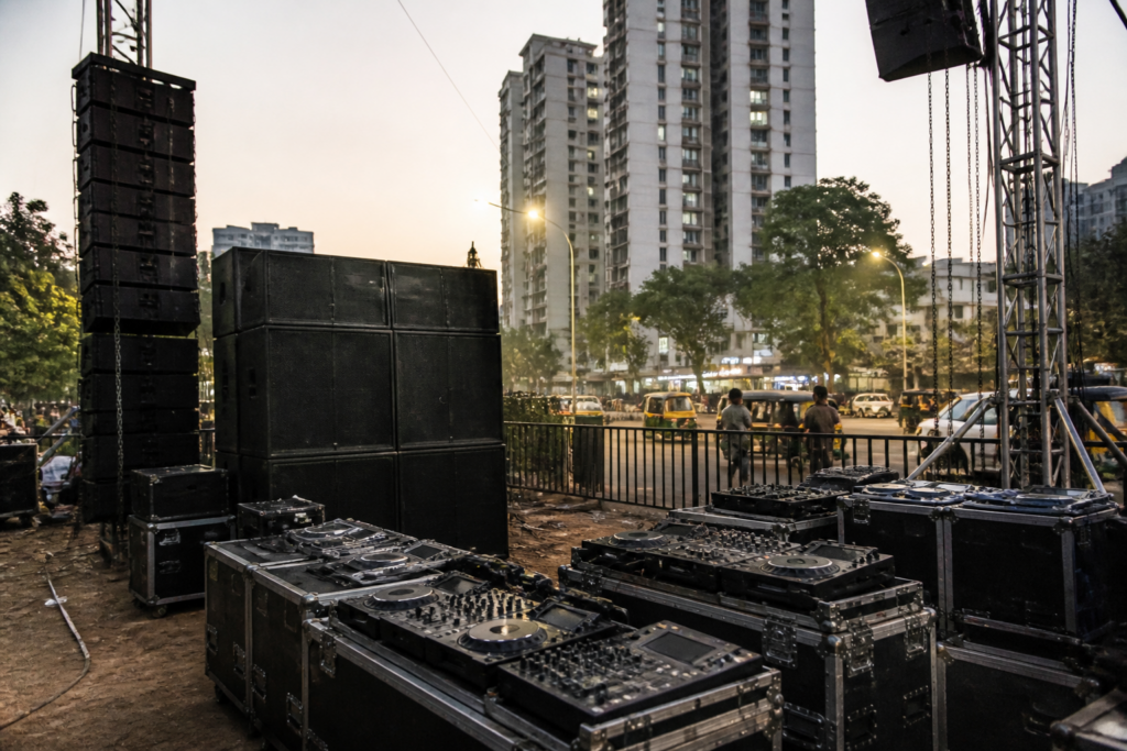 Festival sound equipment and loudspeakers set up near an urban public venue in Thane, Maharashtra