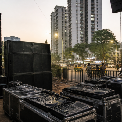 Festival sound equipment and loudspeakers set up near an urban public venue in Thane, Maharashtra