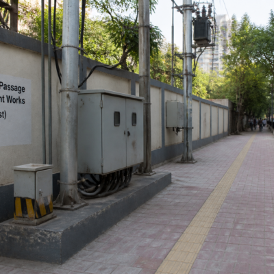 Passage near electric pole in Borivali (W) requiring civil infrastructure improvement under Mumbai Municipal Corporation tender