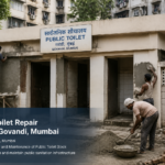 Public toilet block repair underway in Govandi Mumbai showing construction and maintenance workers