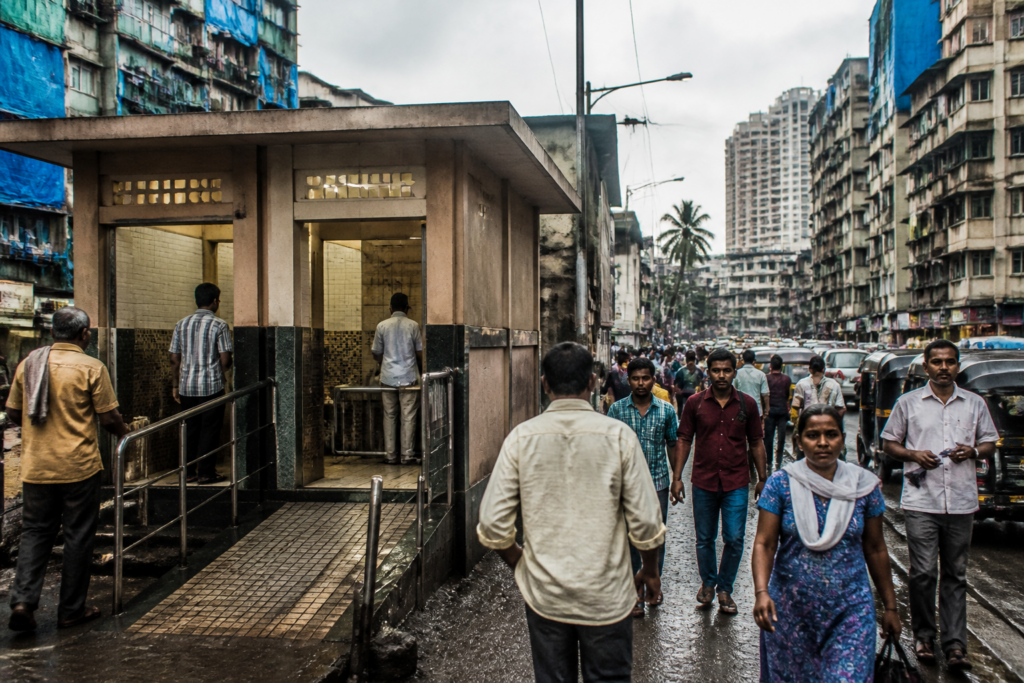Mumbai public toilets and a busy street-level sanitation facility in an urban neighbourhood