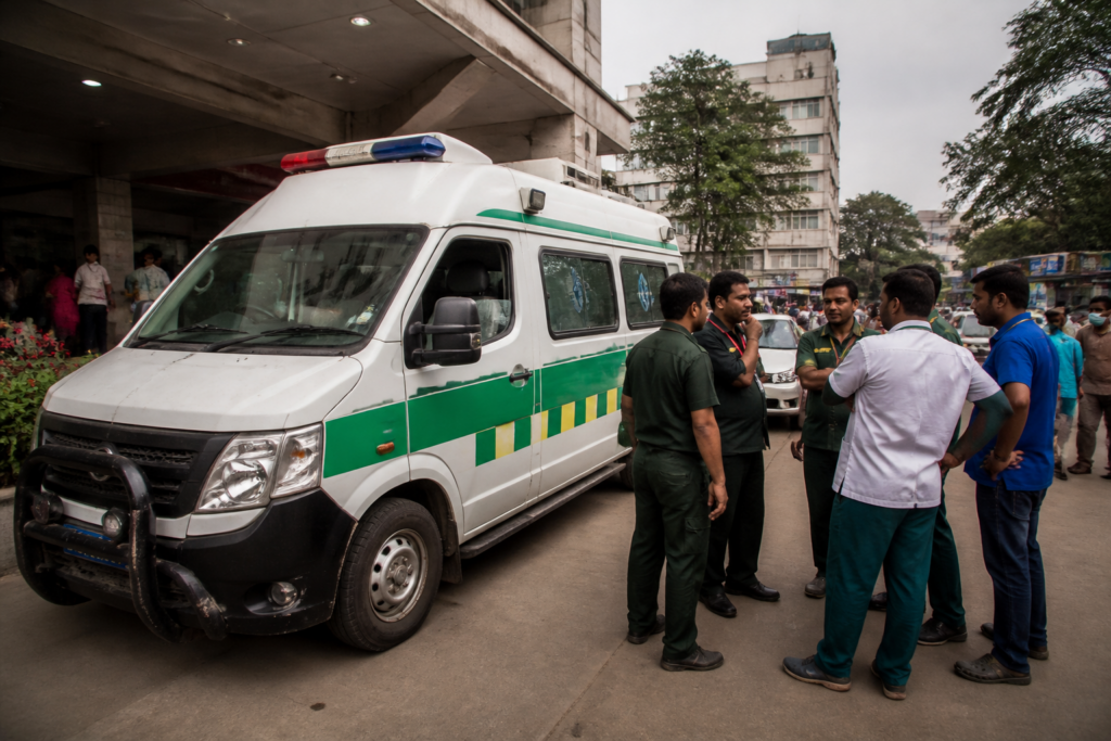 Karnataka 108 ambulance parked on a city street amid a staff strike threat