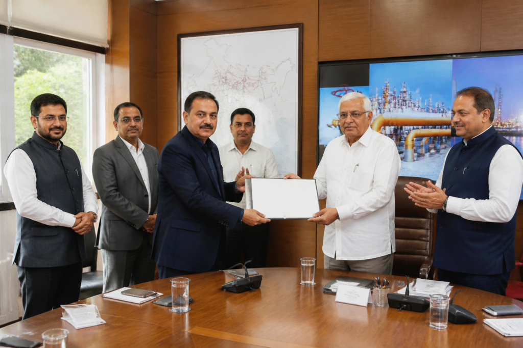 Gujarat Energy dividend cheques presented to the Gujarat government in Gandhinagar
