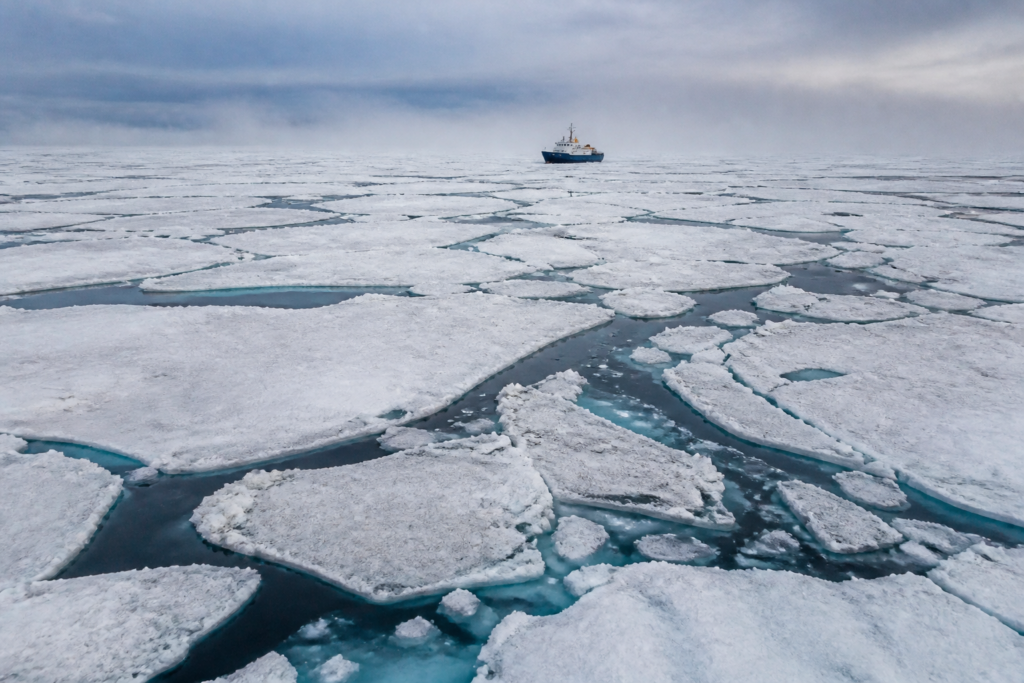 Arctic sea ice viewed from above, illustrating declining polar ice extent and climate monitoring.
