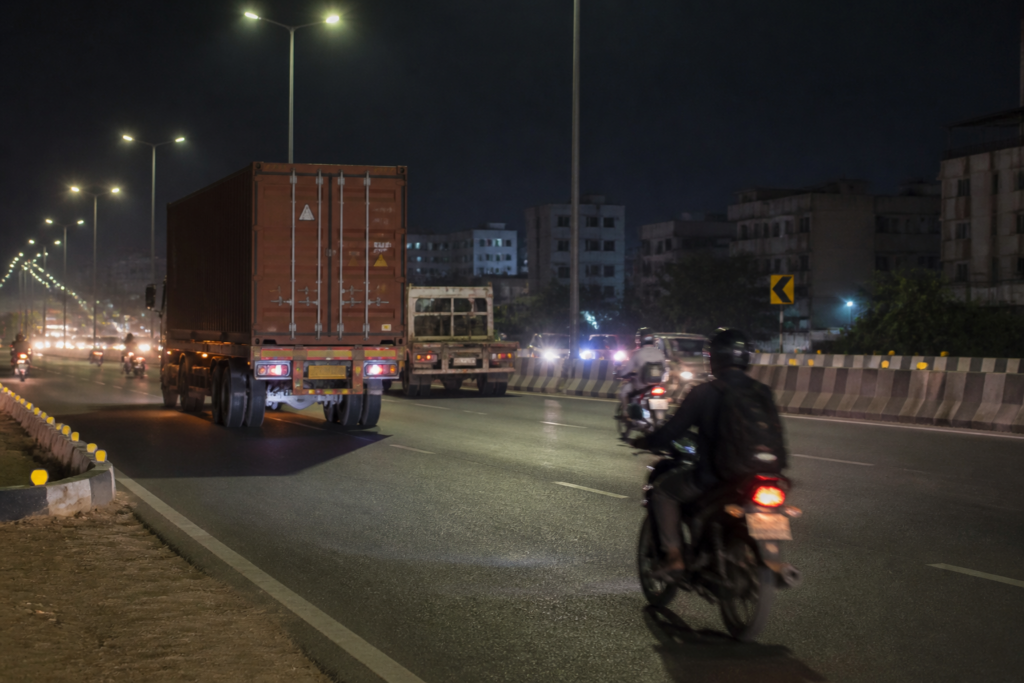 Ahmedabad Ring Road accidents scene with traffic and heavy vehicles on a city highway