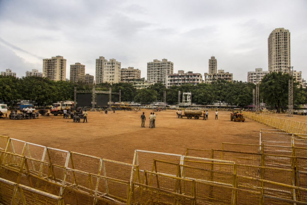 Shivaji Park Dussehra rally venue in Mumbai with an open public ground and surrounding urban buildings