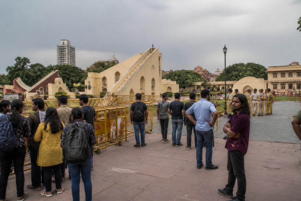 Jantar Mantar protest site in New Delhi with police barricades and demonstrators