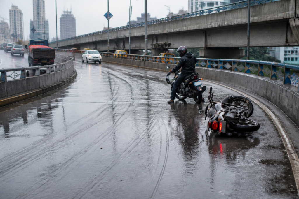 Kolkata flyover safety concern on a rain-wet coloured road surface