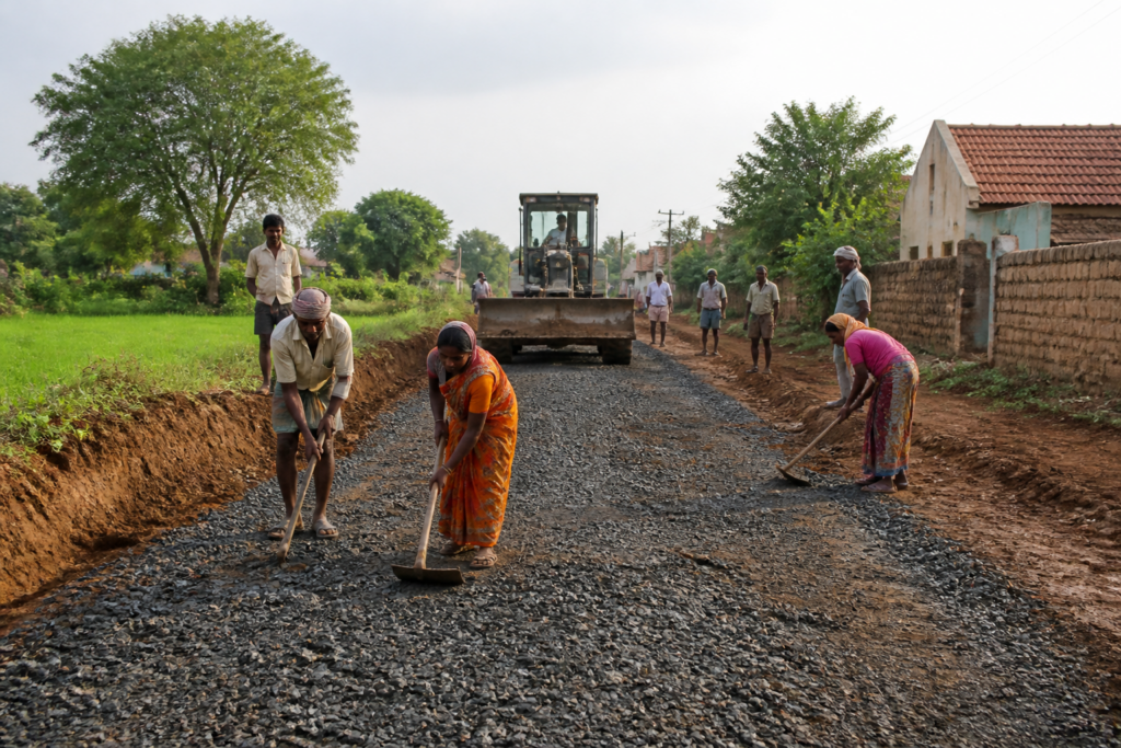 Karnataka rural employment scheme workers building a village connectivity road