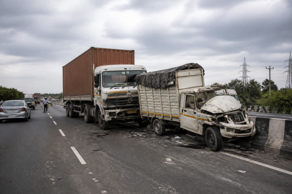 Pune-Solapur Highway accident scene near Varvand involving a container and tempo