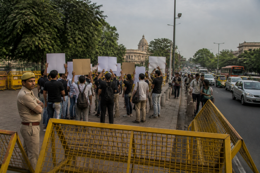 Jantar Mantar protest site in New Delhi with police barricades and civic buildings in the background