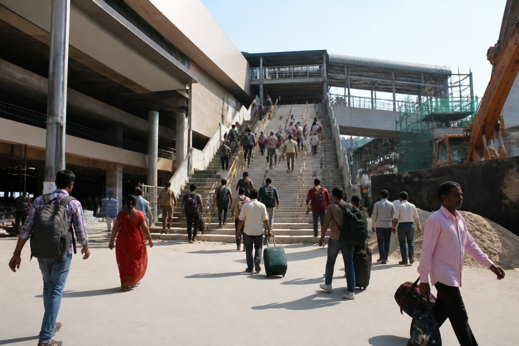 Ahmedabad Kalupur railway station redevelopment building with stair access to the platforms