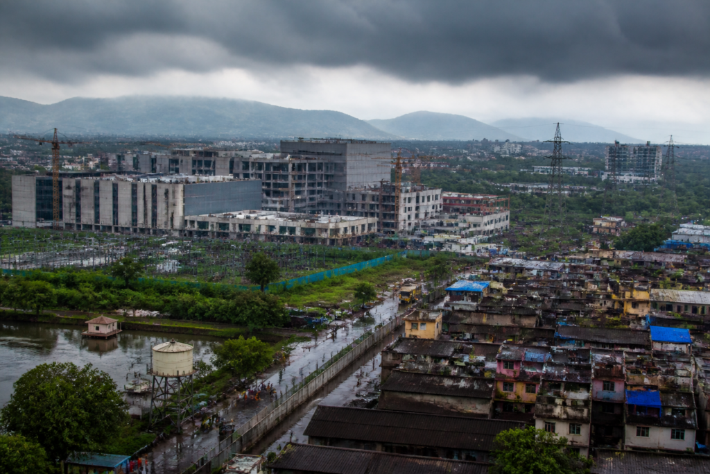Maharashtra data centres rising near a dense Mumbai-region neighbourhood and utility infrastructure