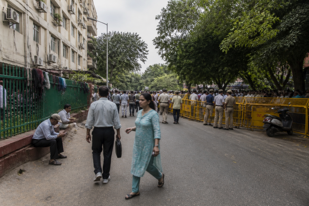 Jantar Mantar protest site and surrounding Delhi streets with security barriers and residents