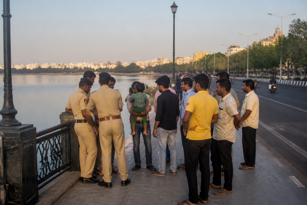 Hussainsagar rescue scene near Tank Bund in Hyderabad with emergency responders by the lakeside