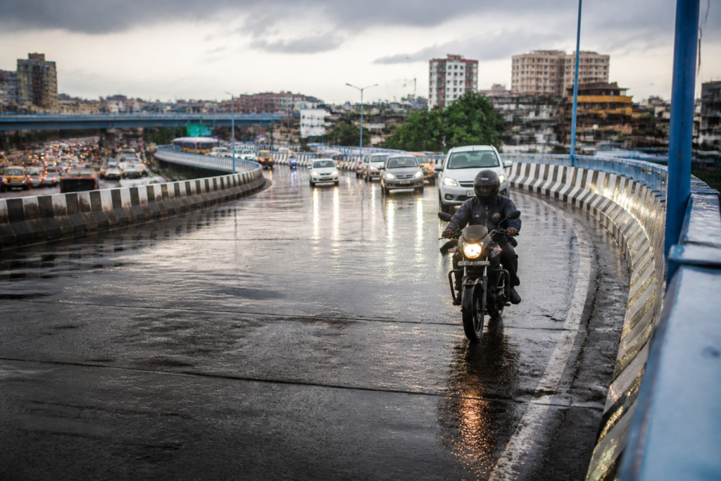 Kolkata flyover accidents after rain on a coloured road surface at Chingrighata