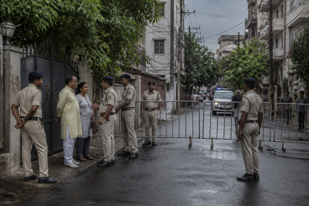 Kolkata Police officers outside a residential area near Mamata Banerjee’s Kalighat home