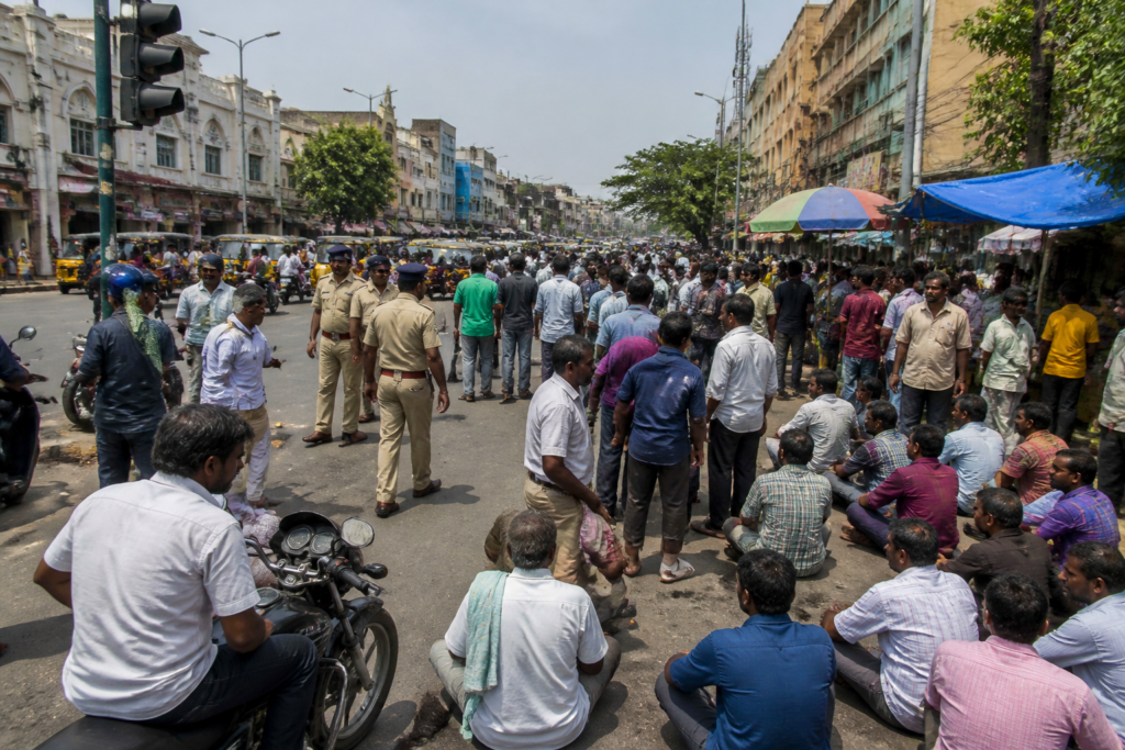 Royapuram street vendors and merchants protest near MC Road in Chennai