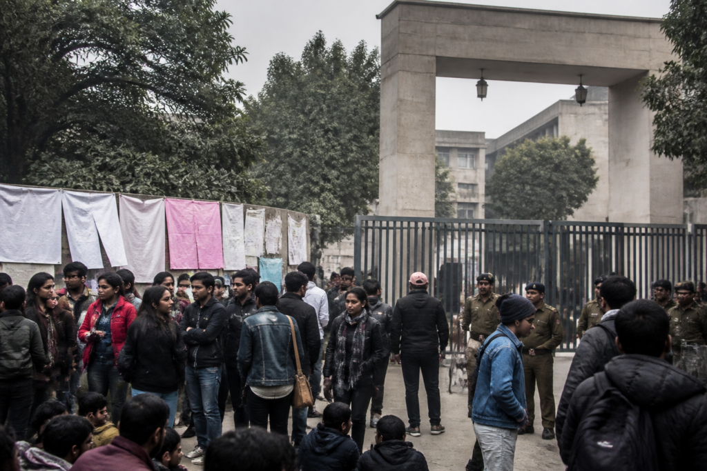 Ambedkar University Delhi campus gates amid a student protest and heightened security