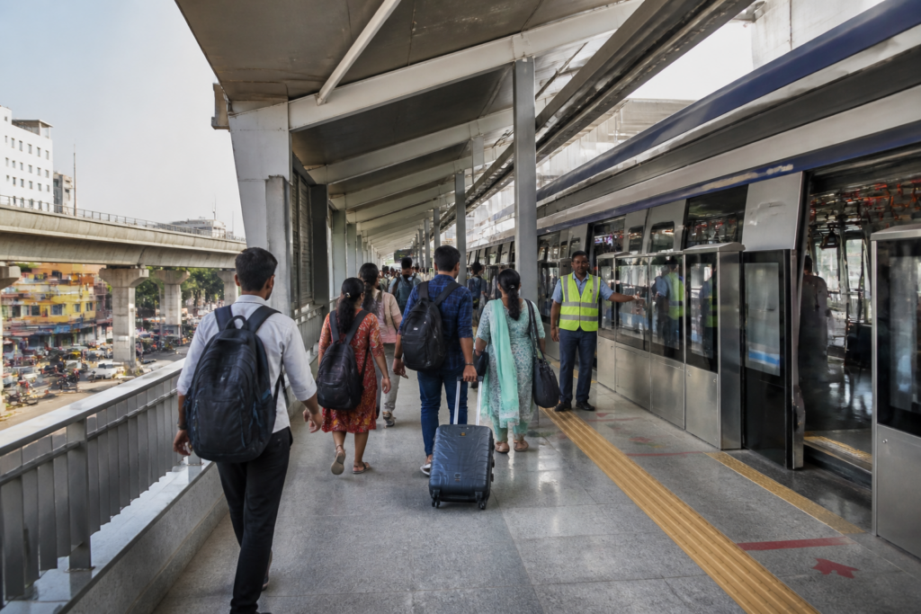 Vadapalani Metro Phase II platform with commuters and open platform screen doors