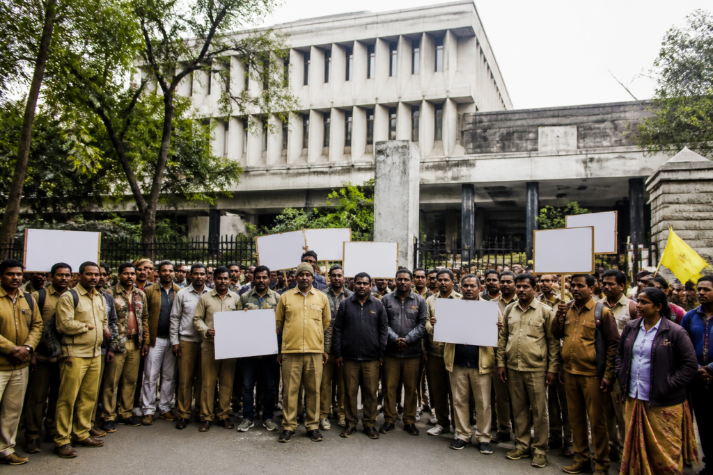 Karnataka forest department outsourced employees protesting outside a government forest office
