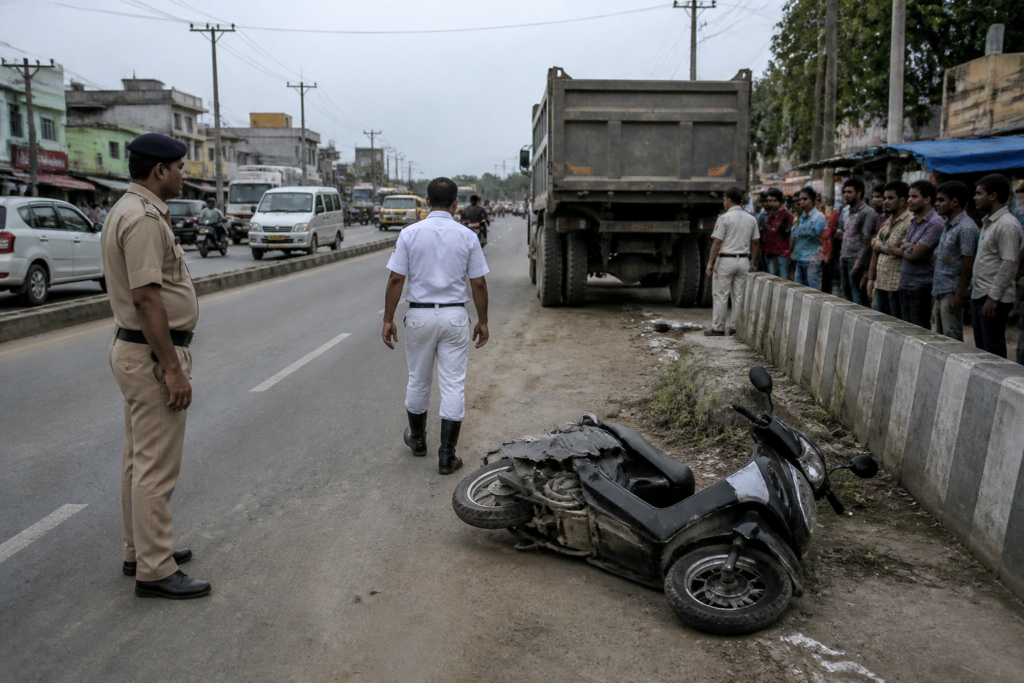 Police at the site of the Shantipur dumper crash on National Highway 12