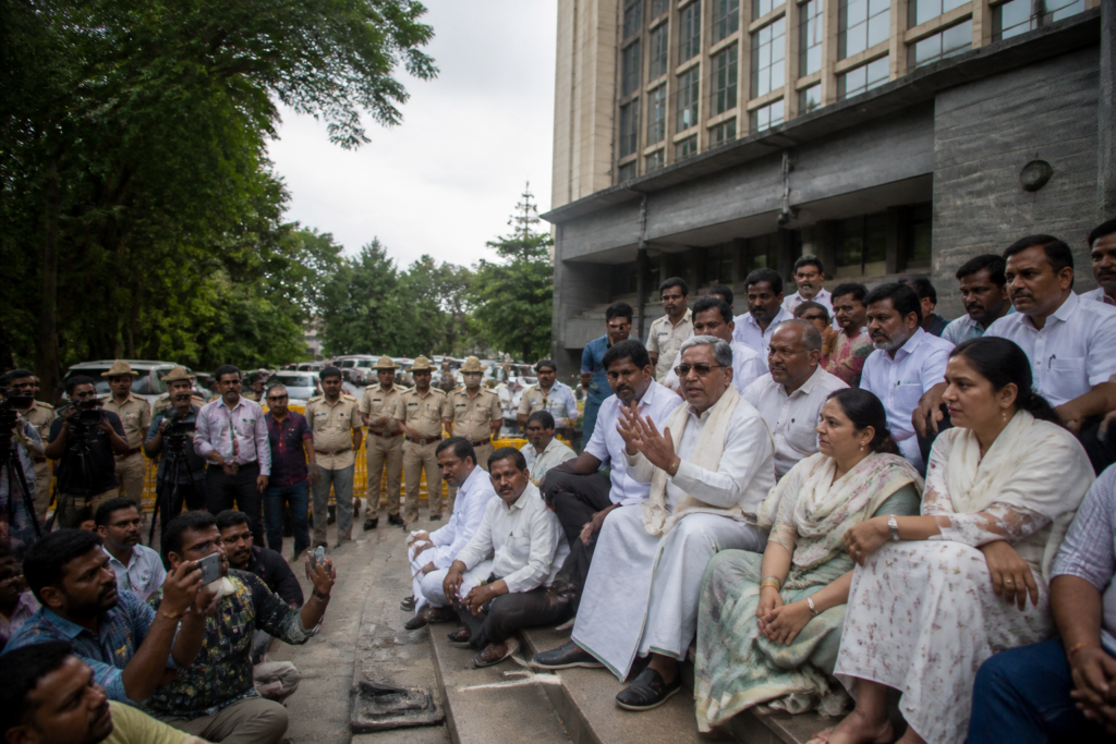 H.D. Kumaraswamy protesting outside the Bengaluru police commissioner’s office over a Bengaluru police FIR demand