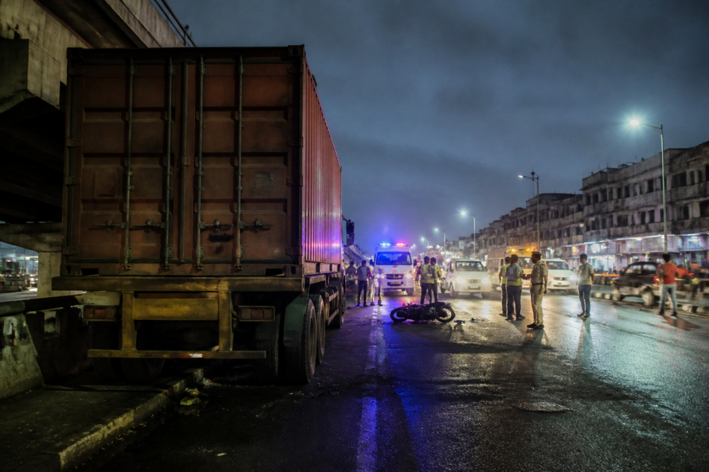 Ahmedabad container truck accident scene near Sanathal Railway Bridge