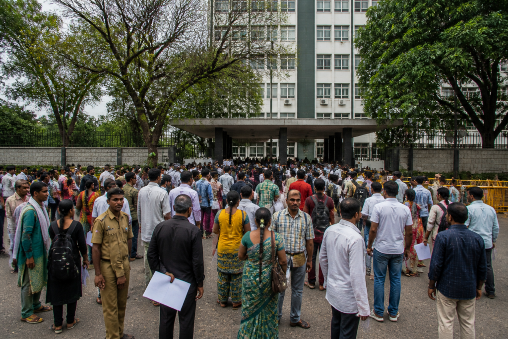 Karnataka forest workers gathering for a protest outside a government forest office