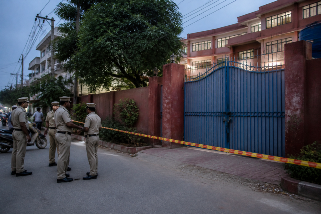 Police presence outside a government school after a Delhi school stabbing in Mohan Garden.