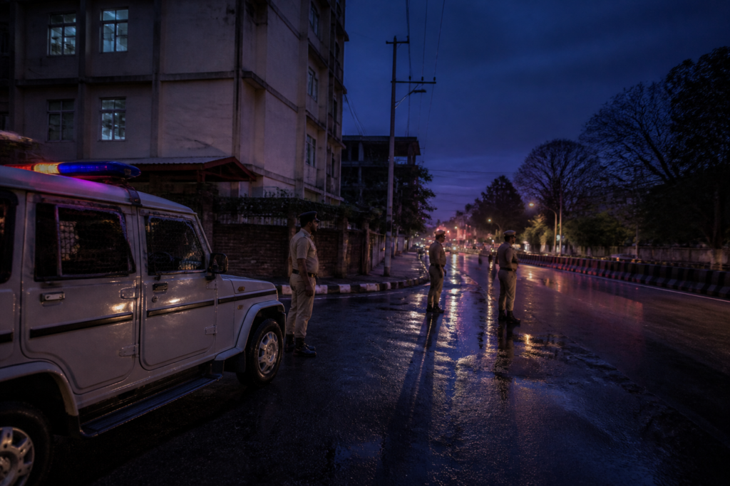 Police vehicle near a Guwahati street linked to the bag-snatching case