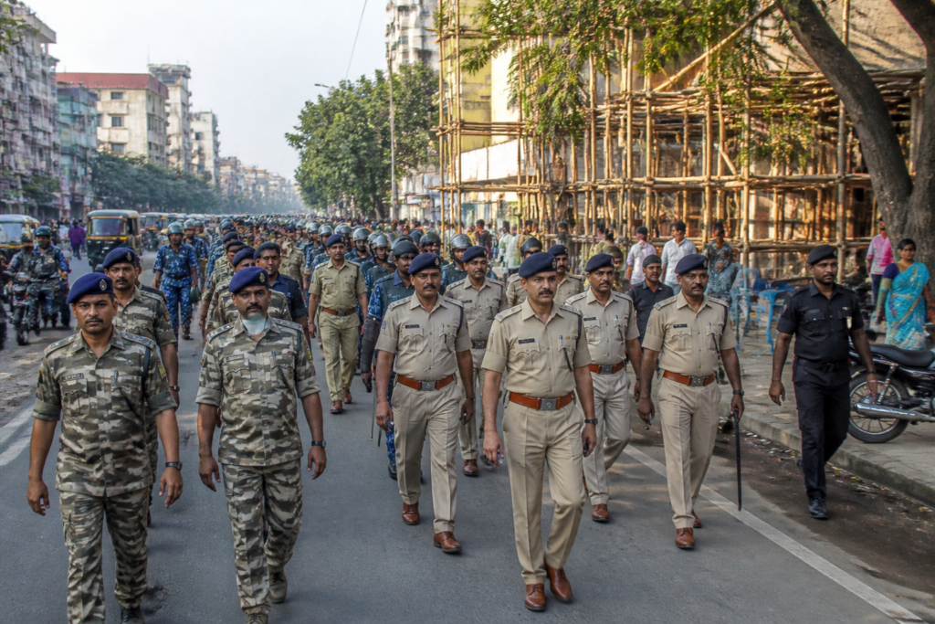 Ranchi Durga Puja security forces conduct a flag march along a city road