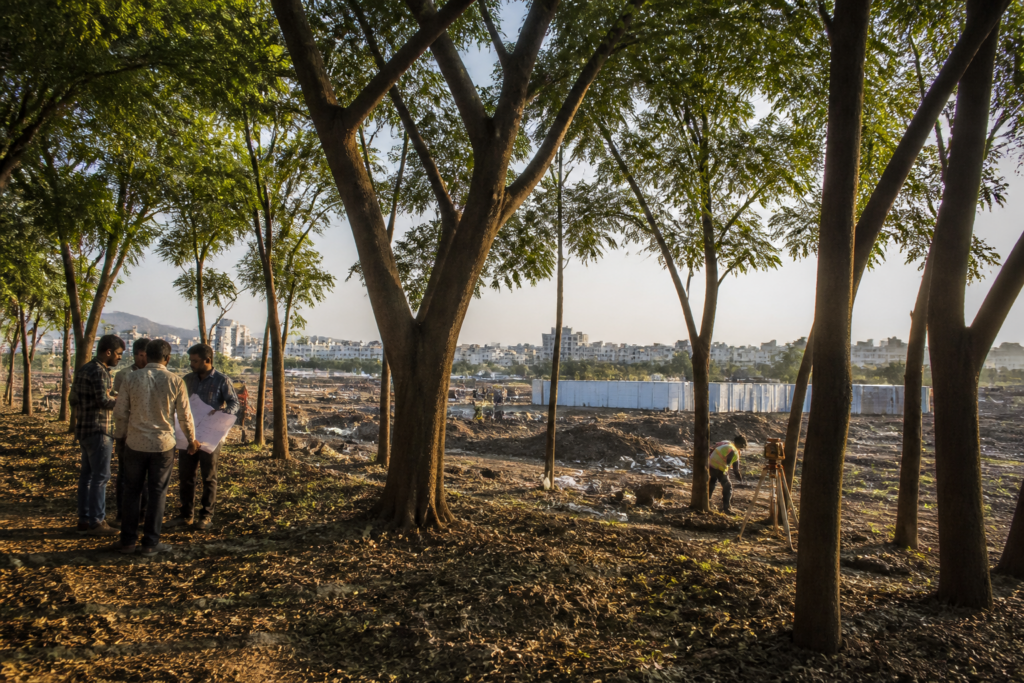 Nashik Sadhugram site at Tapovan with trees and planned Kumbh infrastructure