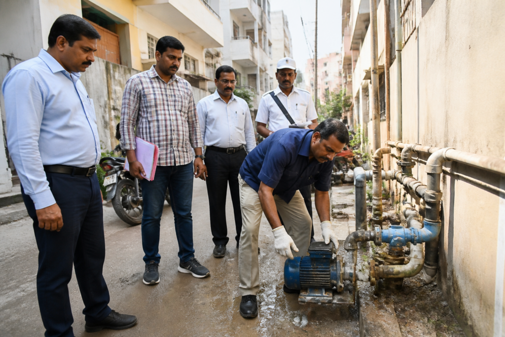 Hyderabad water board officials inspecting a drinking-water pipeline in Kukatpally