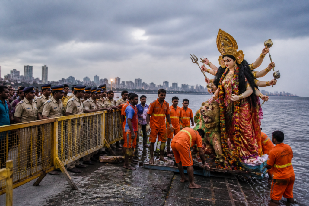 Durga immersion 2026 Mumbai preparations near a city shoreline with police and civic workers