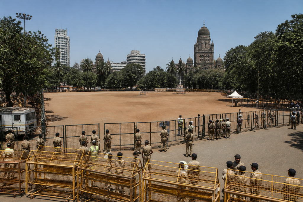 Mumbai protest area at Azad Maidan with police barricades and crowd-control arrangements