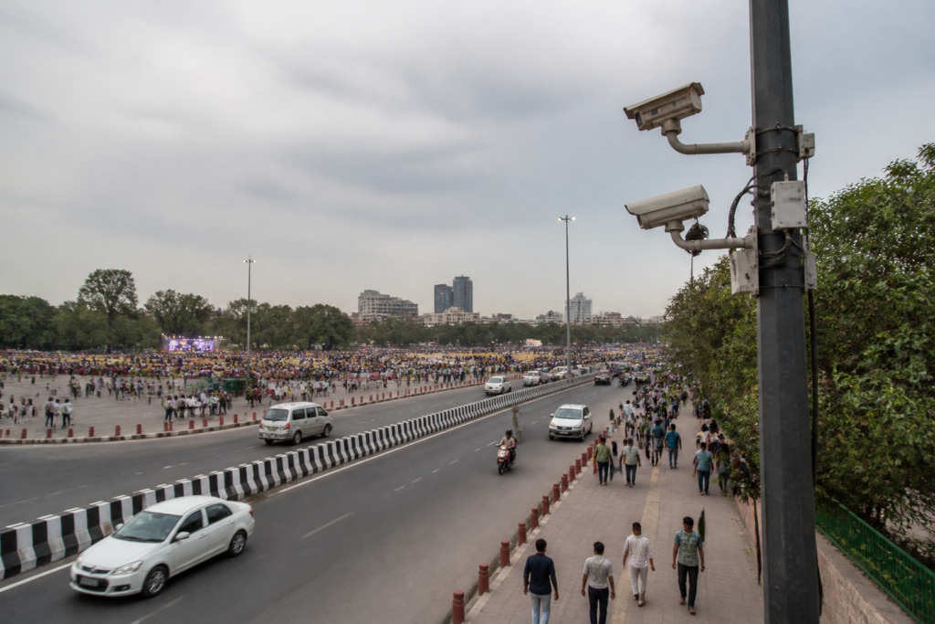 Delhi surveillance cameras overlooking a public gathering space near Ramlila Maidan