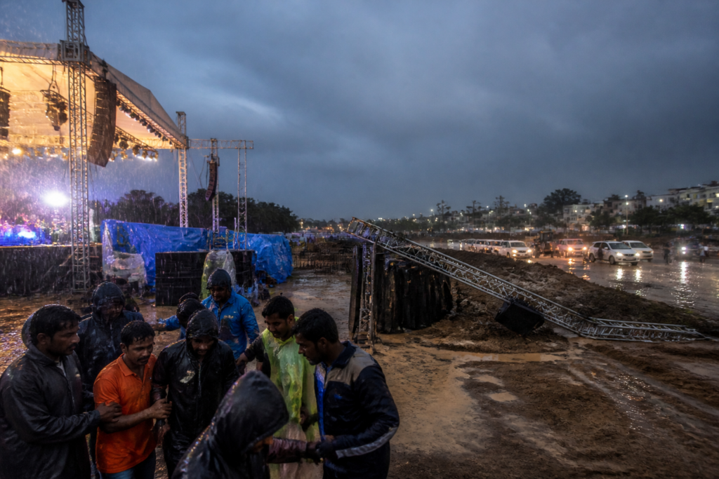 Yuva Dasara Mysuru venue during heavy rain as spectators leave an outdoor event