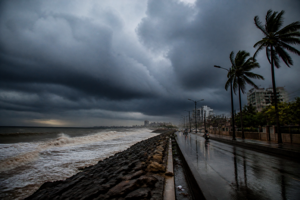 Arabian Sea cyclone clouds over Maharashtra's coastal landscape